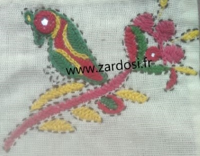 Talisman brodé oiseau, symbole de liberté et broderie indienne